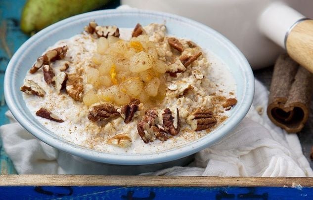 Stewed-pear, cinnamon and sweetened pecans porridge.