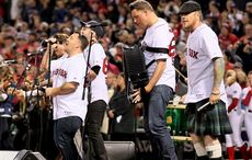 Al Barr, lead singer for the Dropkick Murphys, singing for a stadium full  of fans at Fenway Park, Boston Stock Photo - Alamy