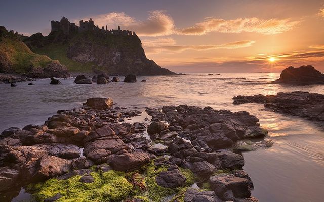 Dunluce Castle, Bushmills, County Antrim: The rugged Northern Ireland coast.