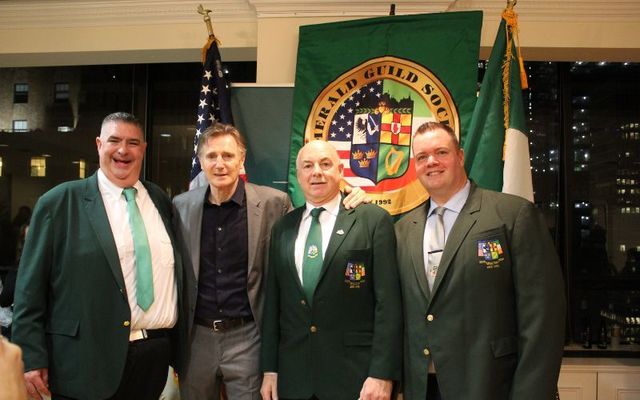 Liam Neeson with members of the Emerald Guild Society at the Irish Consulate last week. 