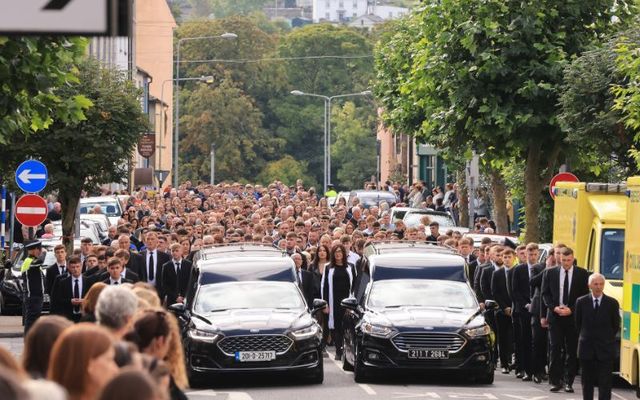 September 1, 2023: The coffins of brother and sister Luke and Grace McSweeney arrive at St Peter and Paul\'s Church, Clonmel, for their funeral.