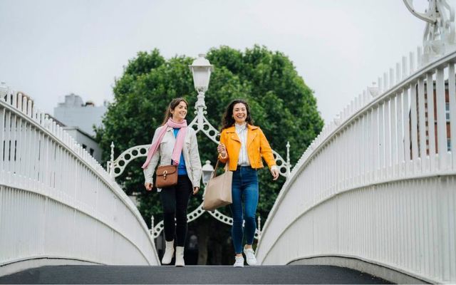 Walking on Dublin\'s Ha\'penny Bridge.