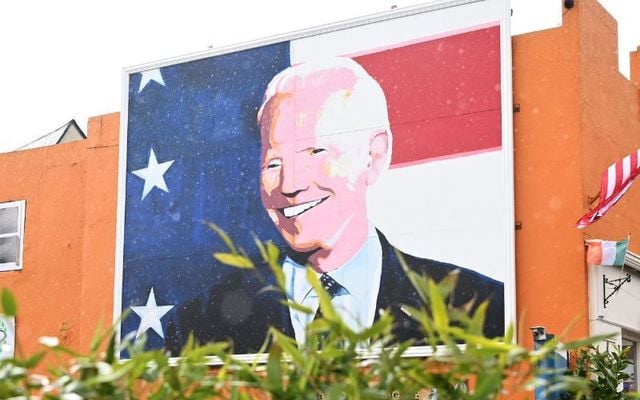 April 14, 2023: A mural of US President Joe Biden is displayed on a building prior to the arrival of US President Joe Biden for a celebration event outside St Muredach\'s Cathedral in Ballina, Co Mayo.