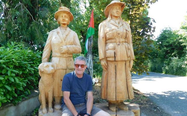 Chainsaw sculptor Will Fogarty, pictured with two pieces created by him for Tipperary Town Heritage Sub group; Veterinary Surgeon Aleen Cust on the left, and a Cumann na mBan lady on the right.