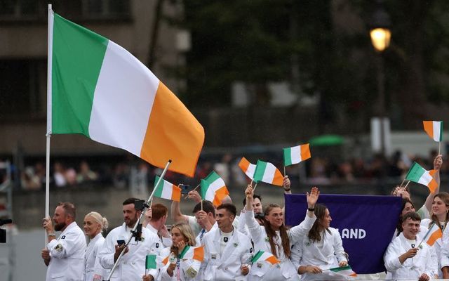 July 26, 2024: Athletes of Team Ireland wave their flags on the team boat along the River Seine during the opening ceremony of the Olympic Games Paris 2024 in Paris, France.