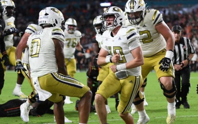 Georgia Tech quarterback Haynes King celebrates a touchdown.