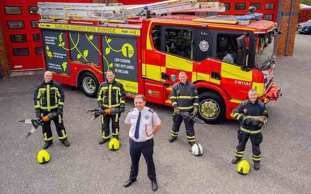 Fire Officers Ronan Boyle, Daniel Fitzpatrick, Darrell Hayden, Joseph O\'Reilly, and Carlow Chief Fire Officer Liam Carroll at Carlow Fire Station for the launch of the first fire engine in the world combining state-of-the-art software with hydrotreated vegetable oil on Wednesday, August 28. 