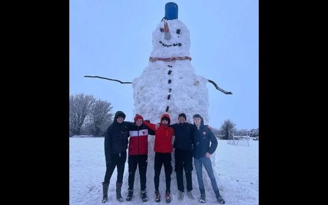 Limerick snowman \'Big Bill\' and his proud creators.