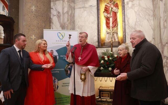 February 12, 2025: (L to R) Louise O\'Reilly, David Lovett, Bishop Denis Nulty, Margaret Gleeson, and Jimmy Moynihan at Whitefriar Street Church in Dublin.