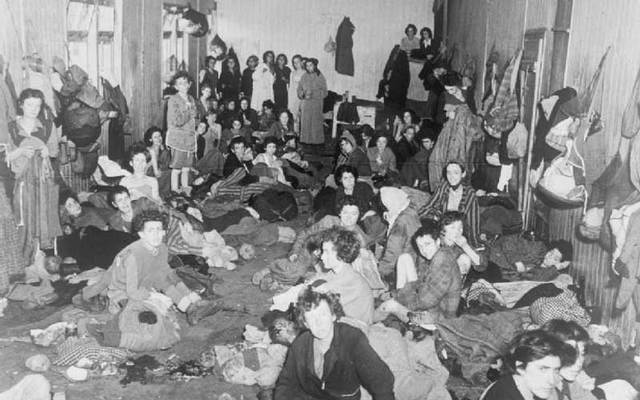 April 1945: Women and children crowded in one of the huts at the Bergen-Belsen concentration camp. 