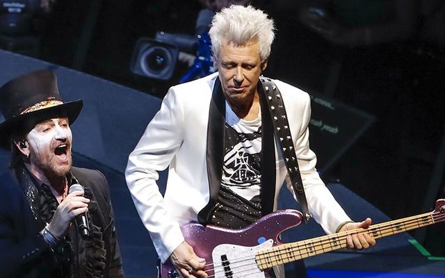 adam clayton bass player