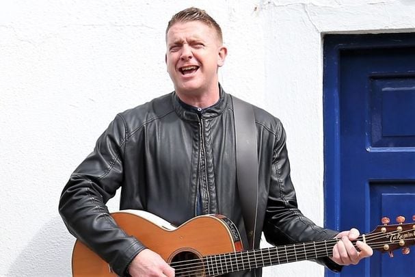 Singer songwriter Damien Dempsey sings a famous cover of \"Rocky Road to Dublin\".