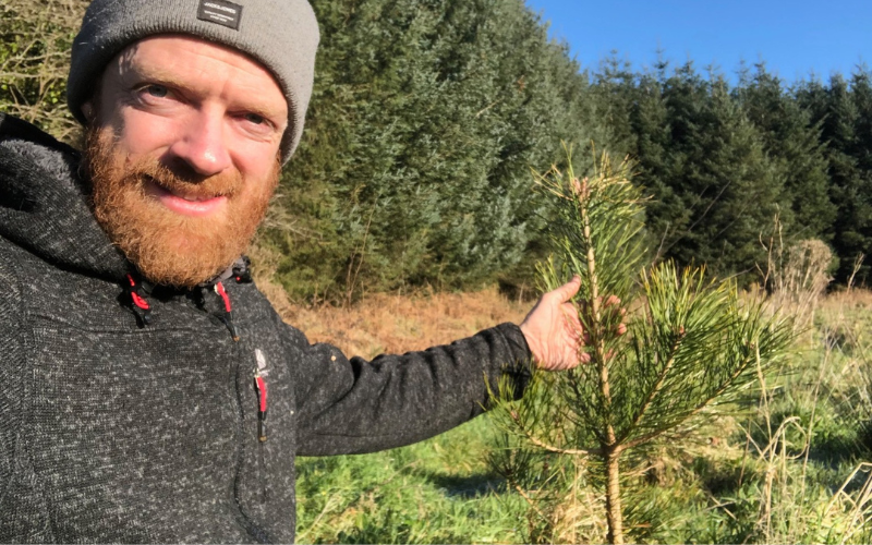 Farmer Tim Daly, proudly displaying some of his early saplings in West Cork planted by Irish Heritage Tree.