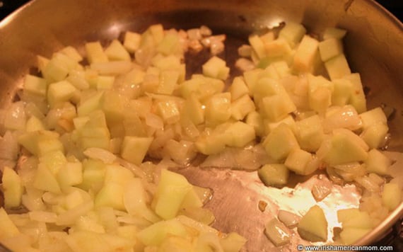 Add the peeled and diced apple to the pan.